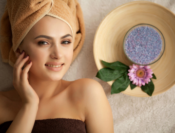A guest resting during a calm facial treatment